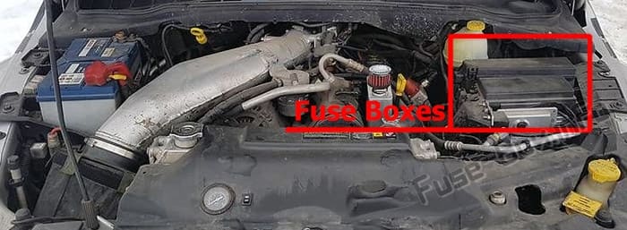 The location of the fuses in the engine compartment: Dodge Durango (2006-2009)