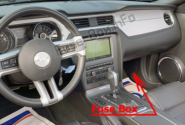 The location of the fuses in the passenger compartment: Ford Mustang (2010-2014)